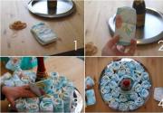 소녀와 소년을위한 선물로 자신의 손으로 기저귀 케이크를 만드는 방법 : 초보자를위한 단계별 마스터 클래스